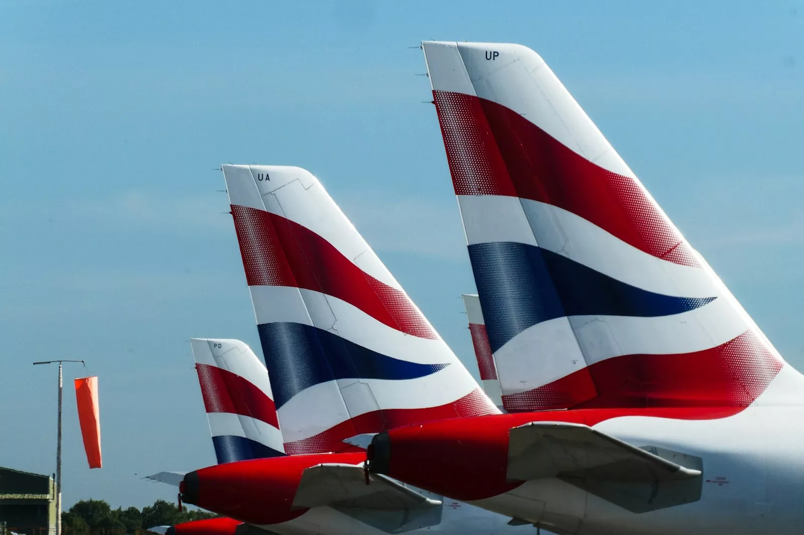 white and red plane on the sky Moffat uk